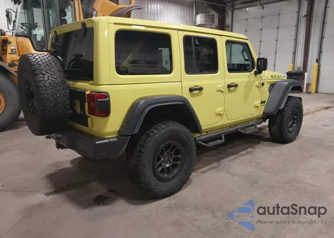 2022 Jeep Wrangler Unlimited High Tide 4X4 z USA, uszkodzony, nr VIN 1C4HJXDG9NW243097